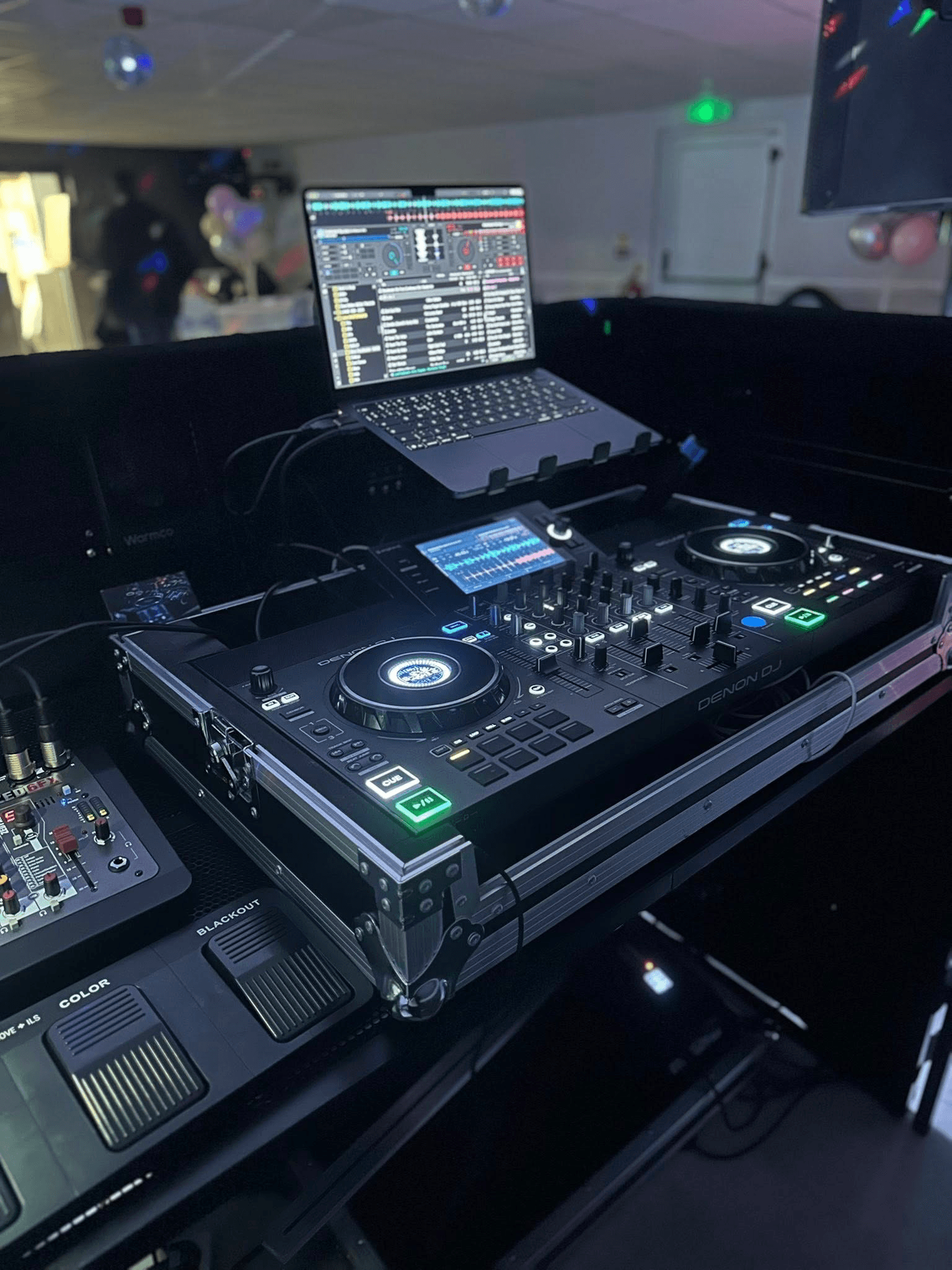 The controller and laptop behind Jordan’s DJ booth